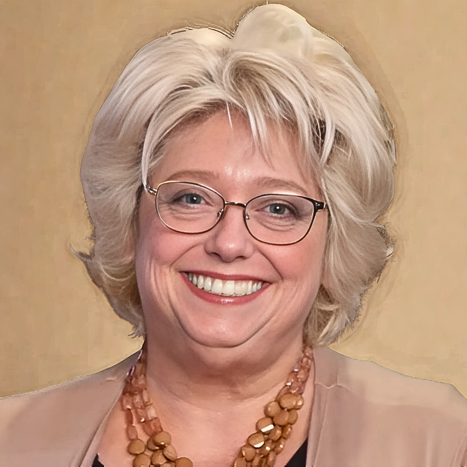 Tammy Kabell headshot 2025 brown background